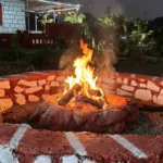 The cozy campfire place near the farmhouse stay at My Adventure Zone in Ananthagiri Hills.