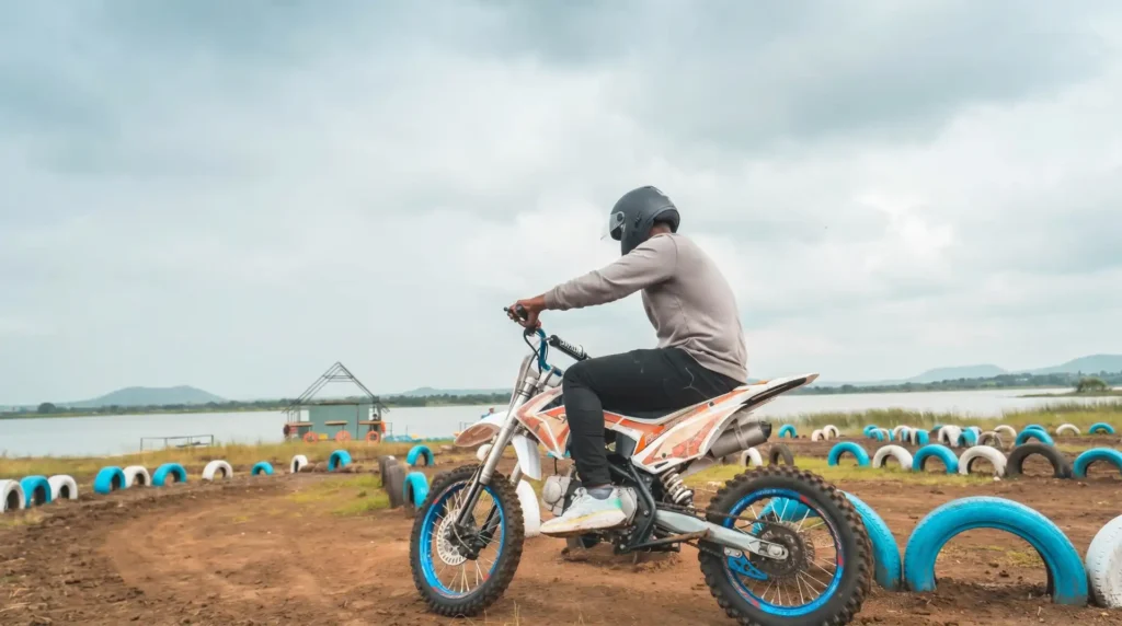 An adventurous dirt bike ride experience for guests at the lakeside camping site of My Adventure Zone.