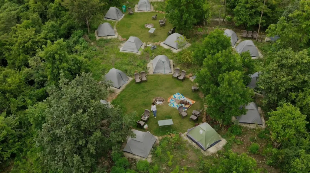 A stunning drone view capturing the entire lakeside camping site at My Adventure Zone.