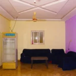 The spacious farmhouse hall area for guests at My Adventure Zone in Ananthagiri Hills.