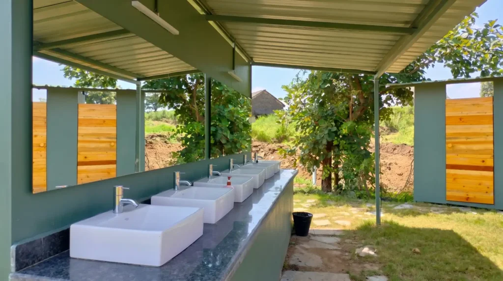 The clean and well-maintained washroom handwash area at the lakeside camping site of My Adventure Zone.